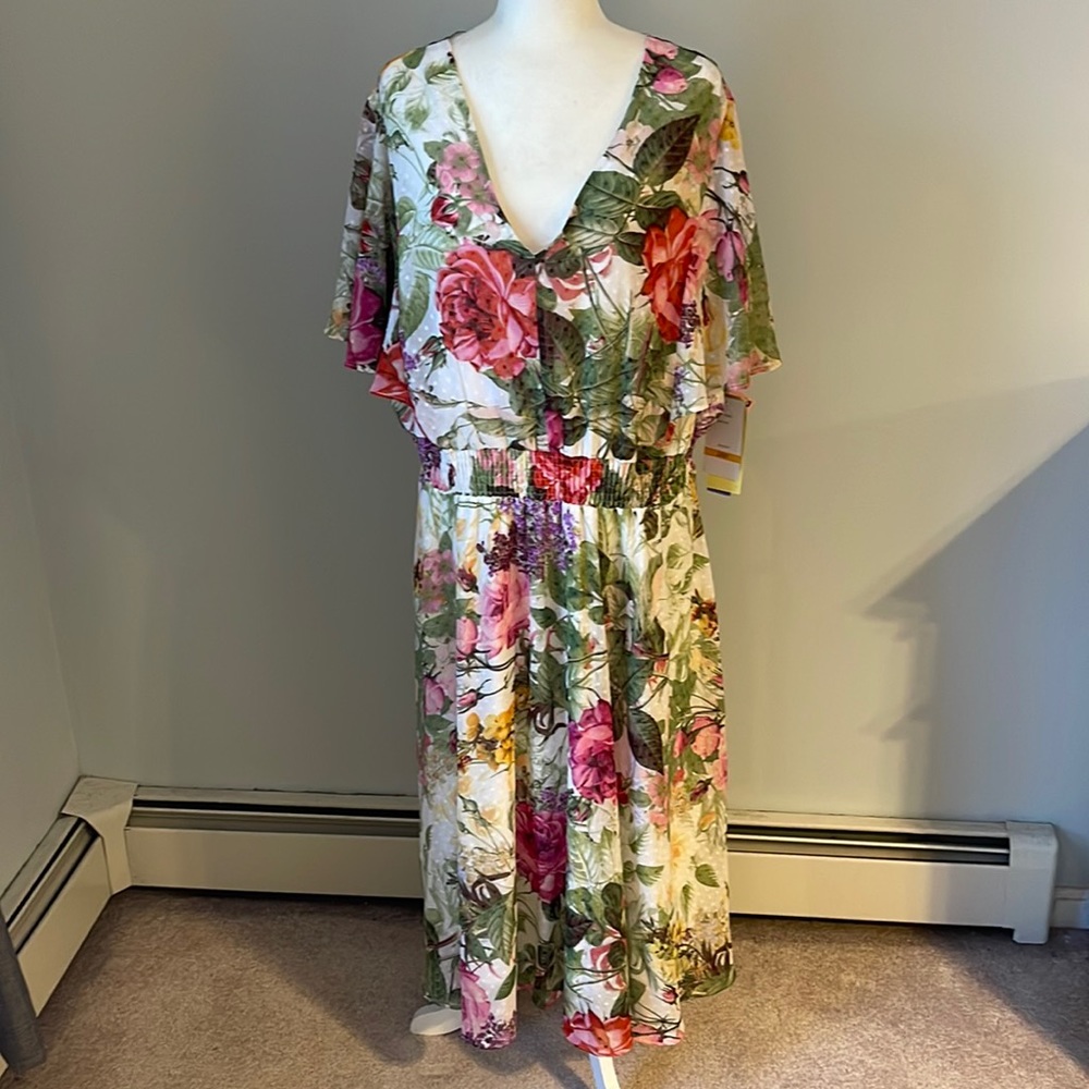 NWT Size 24W Floral midi dress. Back slightly longer. Flutter sleeves.Women Plus
